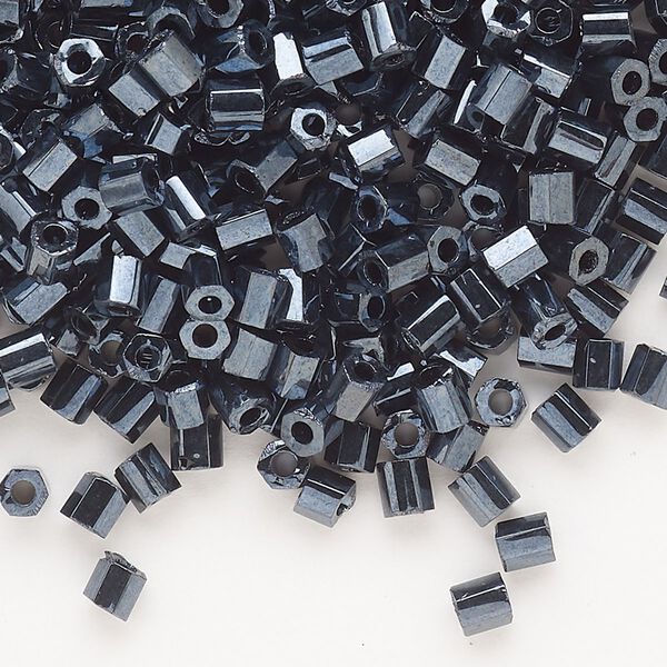 Seed bead, Dyna-Mites™, glass, opaque iris silver, #6 hex 2-cut. Sold per 40-gram pkg. image number 0