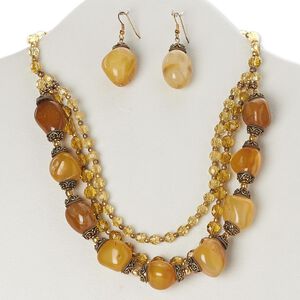 Necklace and earring set, 3-strand, agate (dyed) / glass / antiqued brass / antiqued brass-finished steel, topaz yellow and golden yellow, nugget, 18 inches with toggle clasp, 2-inch earrings with fishhook ear wire. Sold per set.