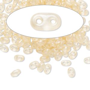 Seed bead, Preciosa Twin™ Czech glass, pkg/50g, 5x2.5mm oval, translucent light peach terra pearl clear, (08192).