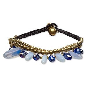Bracelet, glass / sea "opal" glass / nylon / gold-finished steel / brass, cobalt AB and black, 19mm wide with chip and bells, adjustable at 7 and 7-1/2 inches with button clasp. Sold individually.