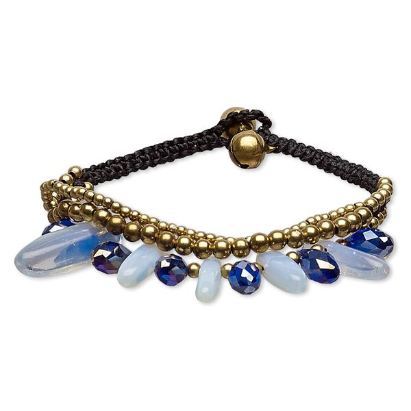 Bracelet, glass / sea "opal" glass / nylon / gold-finished steel / brass, cobalt AB and black, 19mm wide with chip and bells, adjustable at 7 and 7-1/2 inches with button clasp. Sold individually. image number 0