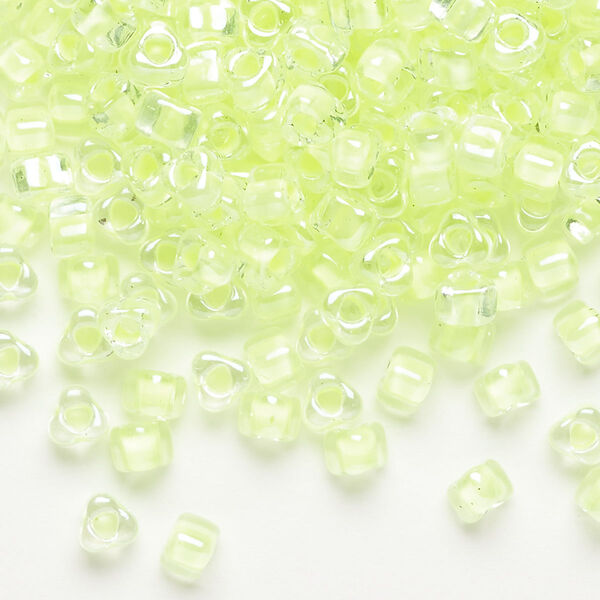 Seed bead, Miyuki, glass, transparent clear color-lined lime, (TR1119), #5 triangle. Sold per 250-gram pkg. image number 0