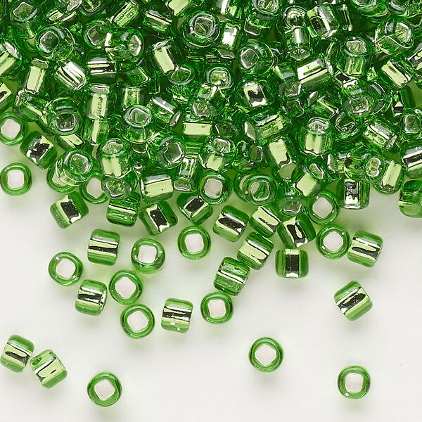 Seed bead, Dyna-Mites™, glass, silver-lined translucent lime, #6 round with square hole. Sold per 40-gram pkg. image number 0