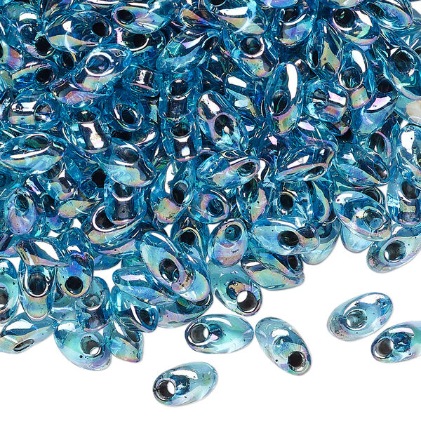 Seed bead, Miyuki, glass, pkg/10g, 7x4mm long magatama, translucent black inside dyed color aqua blue (LMA-2168). image number 0