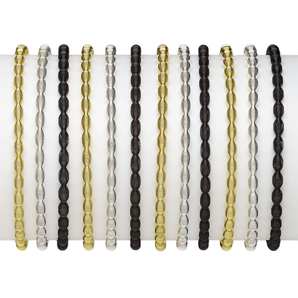 Bracelet, stretch, steel / gold-finished steel / silver-plated steel, black, 4mm wide with oval design, 7 inches. Sold per pkg of 12. image number 0