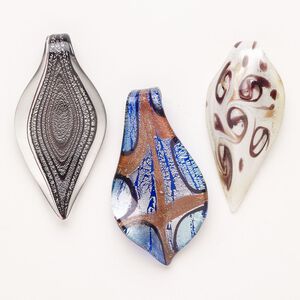 Random focal mix, lampworked glass, opaque mixed colors with silver-colored foil and copper-colored glitter, 53x31mm-70x42mm leaf. Sold per pkg of 3.