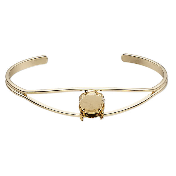 Bracelet, cuff, gold-finished brass, 12mm wide with SS47 4-prong rivoli setting, 7 inches. Sold individually. image number 0