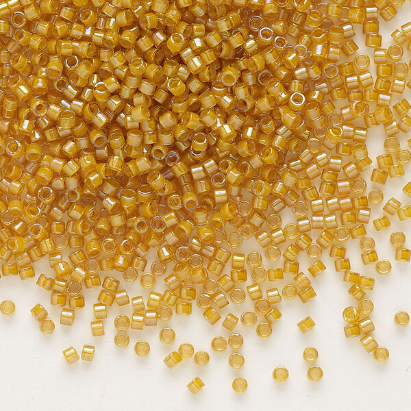 Seed bead, Delica®, glass, pkg/7.5g, #11 round, translucent goldenrod-lined luster topaz (DB-0272). image number 0