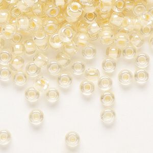 Seed bead, Miyuki, glass, pkg/25g, #6 rocaille, translucent ivory-lined luster crystal clear (RR-2215).