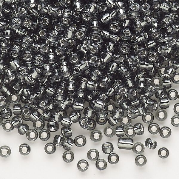 Seed bead, Dyna-Mites™, glass, silver-lined translucent gunmetal, #8 round. Sold per 40-gram pkg. image number 0