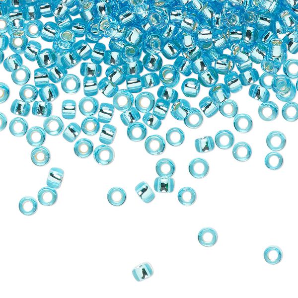 Seed bead, TOHO BEADS®, glass, pkg/7.5g, #8 round, transparent silver-lined aquamarine (TR-08-23). image number 0