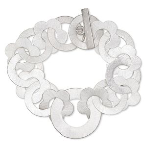Bracelet, silver-plated copper, 21mm interlocking brushed flower with round cutout and 22mm brushed open round, 7 inches with toggle clasp. Sold individually.