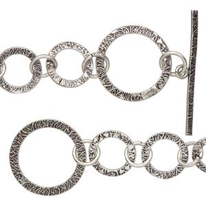 Chain, antique silver-plated copper, 25mm textured round link, 36 inches with toggle clasp. Sold individually.