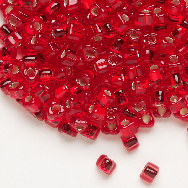 Seed bead, Miyuki, glass, silver-lined translucent red, (TR1808), #5 triangle. Sold per 250-gram pkg. image number 0