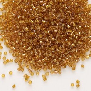 Seed bead, Delica®, glass, pkg/50g, #11 round, translucent topaz-lined luster topaz (DB-0065).