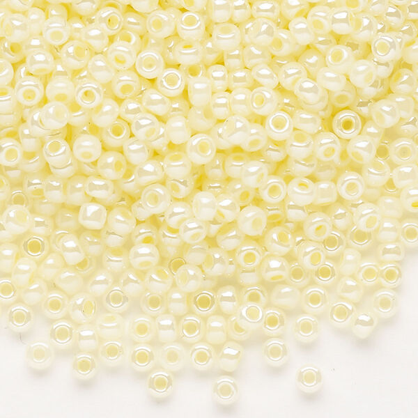 Seed bead, Dyna-Mites™, glass, opaque ceylon pastel cream, #8 round. Sold per 1/2 kilogram pkg. image number 0