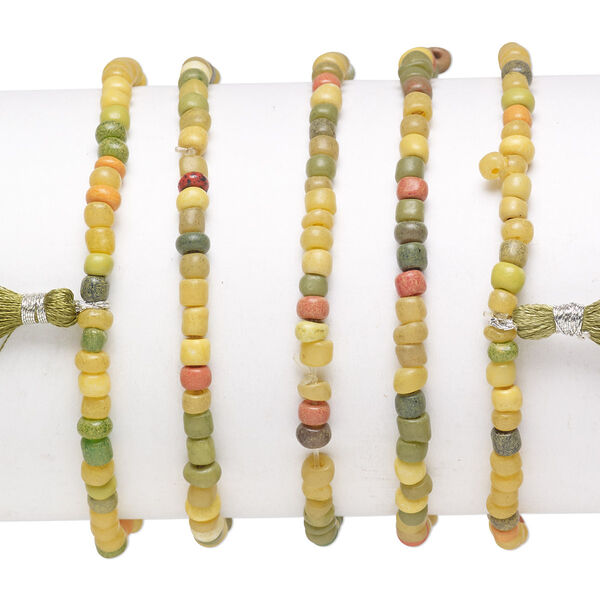 Bracelet mix, stretch, glass, olive green / orange / yellow, #6 round with 45mm tassel, 7-1/2 inches. Sold per pkg of 5. image number 0