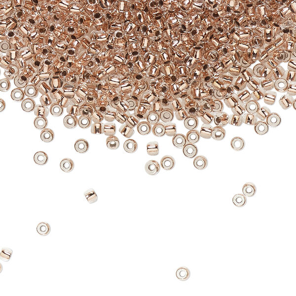 Seed bead, TOHO BEADS®, glass, pkg/50g, #11 round, transparent copper-lined crystal clear (TR-11-740). image number 0