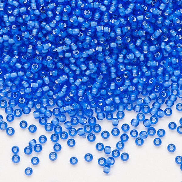 Seed bead, Preciosa Ornela, glass, transparent chalkwhite-lined sapphire, #11 rocaille. Sold per 50-gram pkg. image number 0