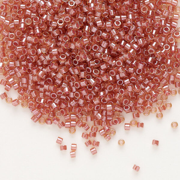 Seed bead, Delica®, glass, pkg/7.5g, #11 round, translucent salmon-lined luster topaz (DB-0913). image number 0