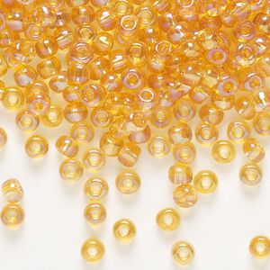 Seed bead, Preciosa Ornela Czech glass, pkg/500g, #6 rocaille, translucent rainbow topaz, (11050).