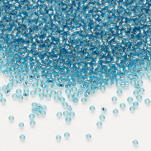 Seed bead, Miyuki, glass, transparent silver-lined ocean blue (RR2429), #15 rocaille. Sold per 250-gram pkg. image number 0