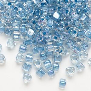 Seed bead, Miyuki, glass, transparent clear color-lined sea blue, (TR1137), #5 triangle. Sold per 250-gram pkg.