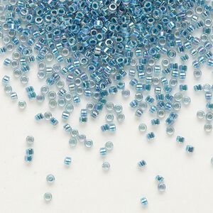 Seed bead, Delica®, glass, pkg/50g, #11 round, translucent marine blue-lined rainbow crystal clear (DB-0058).