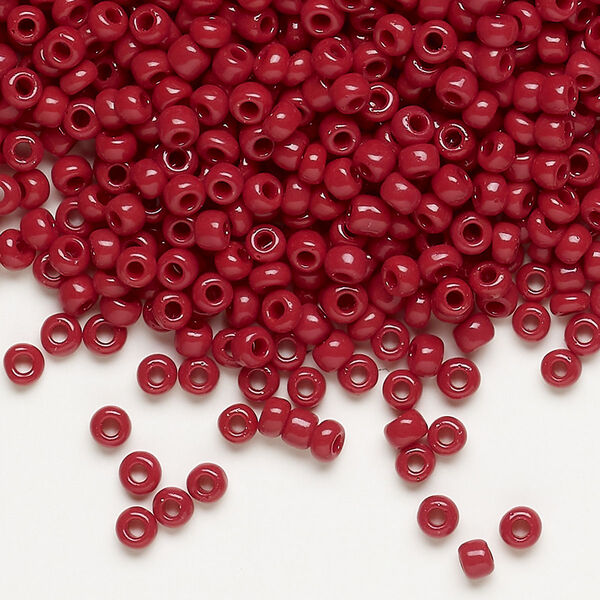 Seed bead, Dyna-Mites™, glass, opaque brick red, #8 round. Sold per 40-gram pkg. image number 0