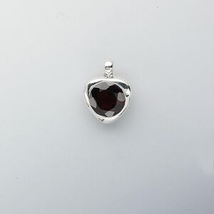 Pendant, sterling silver and garnet (natural), 18x14mm heart, 12mm faceted round. Sold individually.