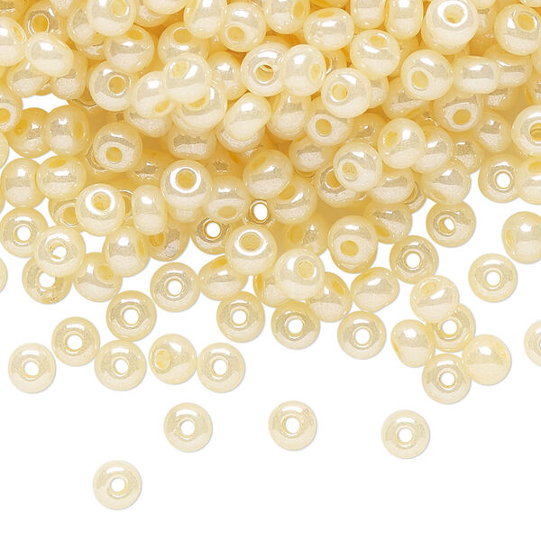 Seed bead, Preciosa Ornela Czech glass, pkg/500g, #6 rocaille, opaque luster light cream pearl, (47113). image number 0