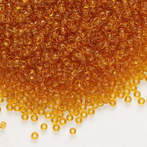 Seed bead, glass, pkg/50g, #10 rocaille, transparent topaz.