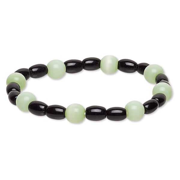 Bracelet, stretch, glass and cat's eye glass, opaque sea green and black, 7-8mm round and 7x5mm-8x6mm barrel, 6-1/2 inches. Sold individually. image number 0