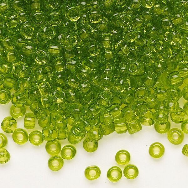 Seed bead, Dyna-Mites™, glass, transparent light green, #6 round. Sold per 1/2 kilogram pkg. image number 0