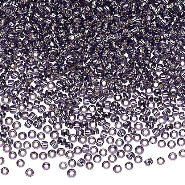 Seed bead, TOHO BEADS®, glass, pkg/7.5g, #11 round, transparent silver-lined tanzanite (TR-11-39). image number 0