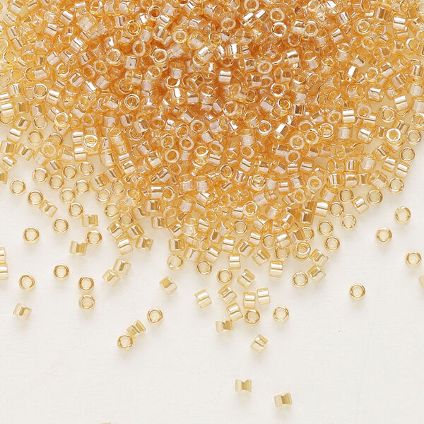Seed bead, Delica®, glass, pkg/7.5g, #11 round, translucent luster light topaz (DB-0099). image number 0