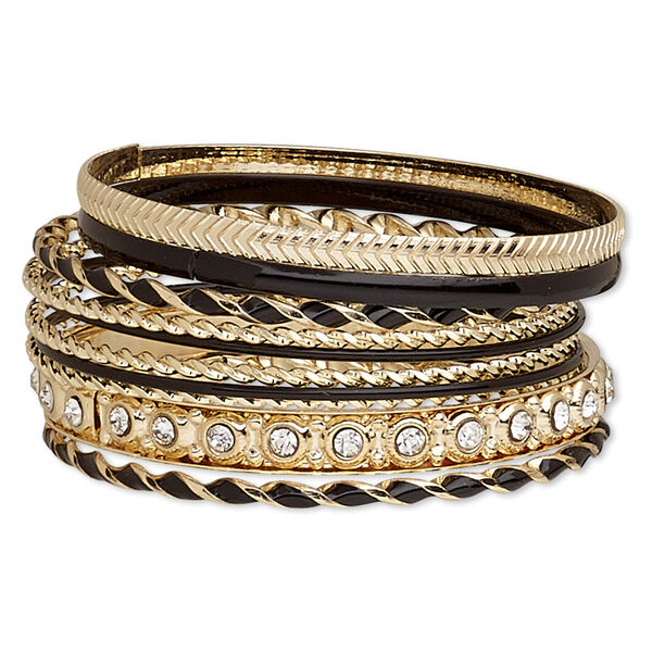 Bracelet, bangle, enamel / glass rhinestone / gold-finished steel, black and clear, 2-8mm wide with twist, 8 to 8-1/2 inches. Sold per 10-piece set. image number 0