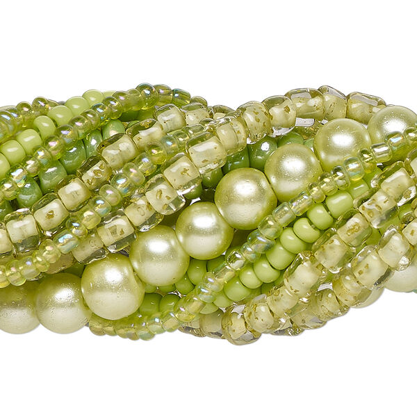 Bead assortment, glass, opaque to transparent light to dark green, 3x1mm-6mm round and irregular rondelle. Sold per pkg of (8) 14-inch strands, approximately 1,200 beads. image number 0