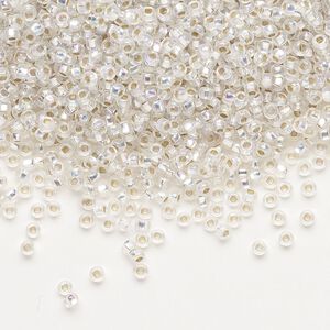 Seed bead, Preciosa Ornela Czech glass, pkg/50g, #11 rocaille, translucent silver-lined rainbow clear, (78109).
