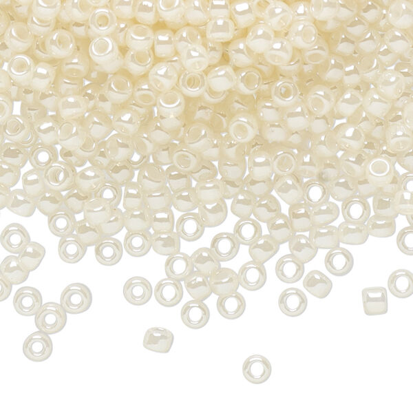 Seed bead, TOHO BEADS®, glass, pkg/7.5g, #8 round, opaque ceylon light ivory (TR-08-147). image number 0