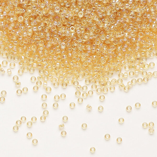 Seed bead, Miyuki, glass, pkg/35g, #15 rocaille, translucent rainbow light topaz (RR-251). image number 0