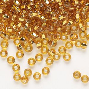 Seed bead, Preciosa Ornela Czech glass, pkg/500g, #6 rocaille, transparent silver-lined topaz, (17050).