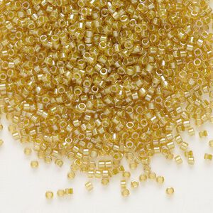 Seed bead, Delica®, glass, pkg/7.5g, #11 round, translucent light peridot-lined luster topaz (DB-0911).