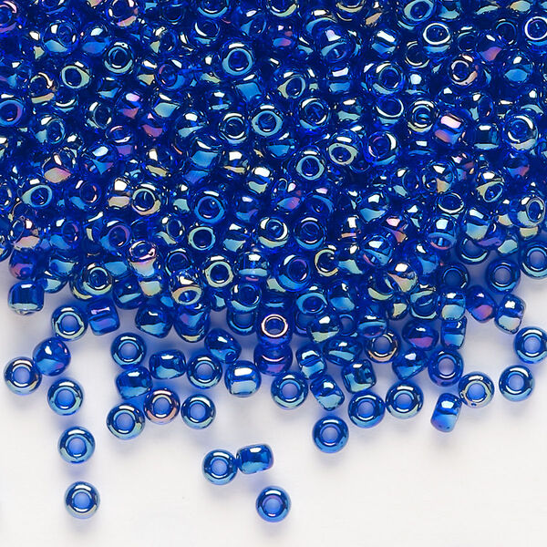 Seed bead, Dyna-Mites™, glass, transparent rainbow iris blue, #8 round. Sold per 1/2 kilogram pkg. image number 0