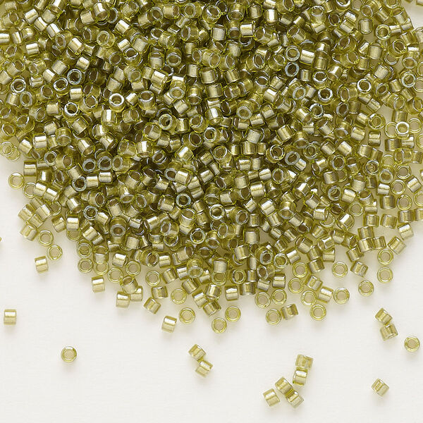 Seed bead, Delica®, glass, pkg/7.5g, #11 round, translucent beige-lined luster chartreuse (DB-0908). image number 0