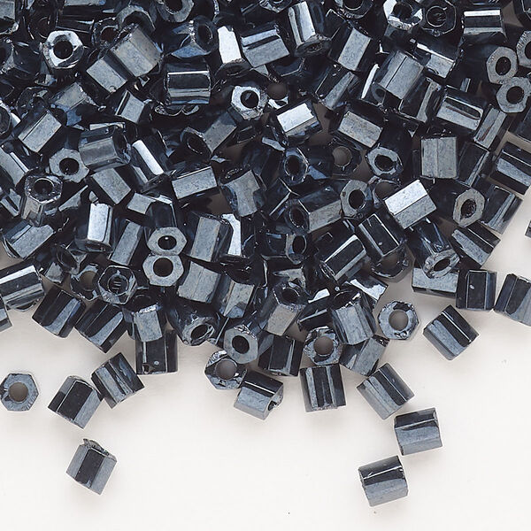 Seed bead, Dyna-Mites™, glass, opaque iris silver, #6 hex 2-cut. Sold per 1/2 kilogram pkg. image number 0