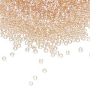 Seed bead, TOHO BEADS®, glass, pkg/50g, #11 round, translucent rainbow rosaline (TR-11-169).