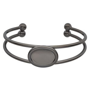 Bracelet, cuff, gunmetal-plated brass and "pewter" (zinc-based alloy), 65x18mm with 18x13mm oval setting, adjustable. Sold individually.