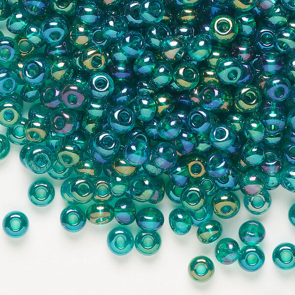 Seed bead, Preciosa Ornela, glass, translucent rainbow teal, #6 rocaille. Sold per 500-gram pkg. image number 0