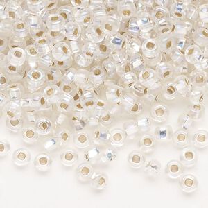 Seed bead, Preciosa Ornela Czech glass, pkg/50g, #6 rocaille, translucent silver-lined rainbow clear, (78109).
